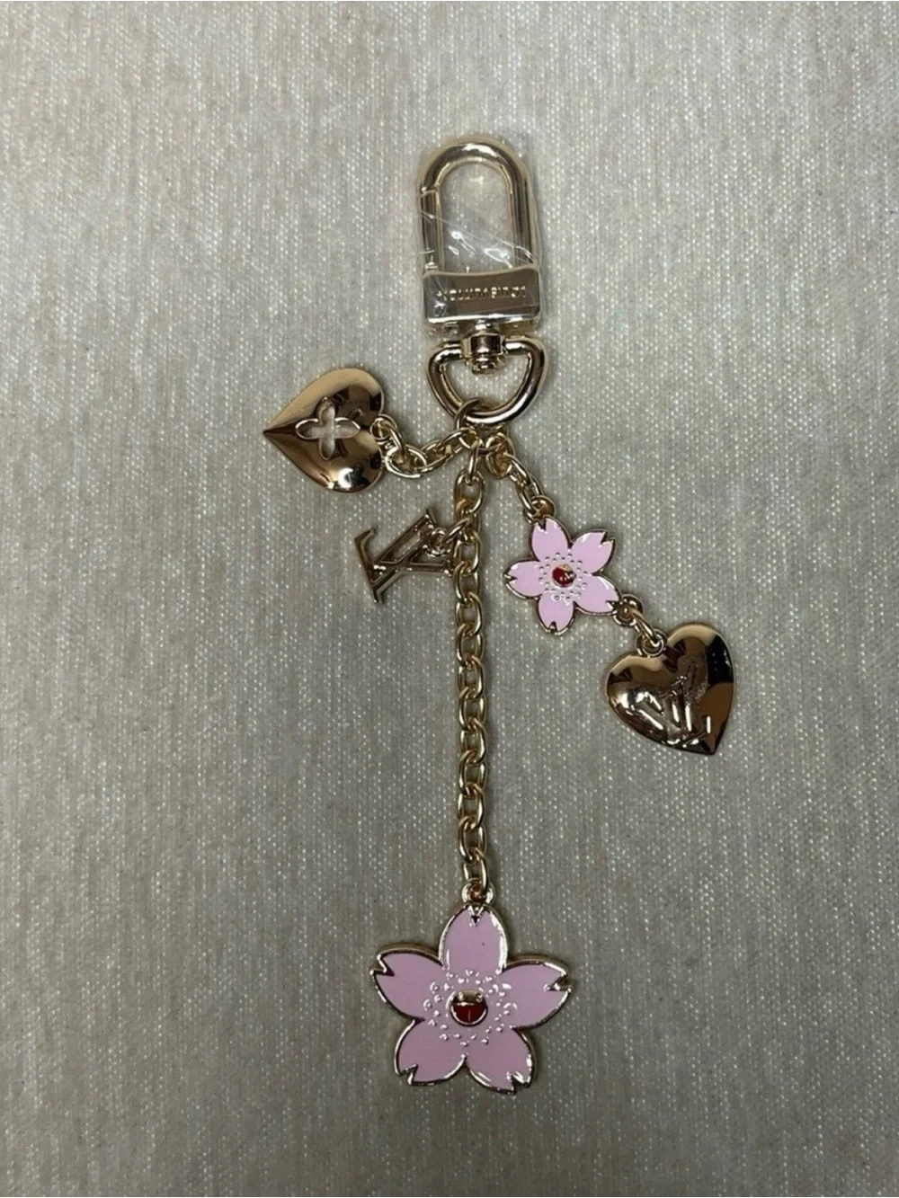 Gold-Tone Pink Flower Charm Keychain with Heart Accents